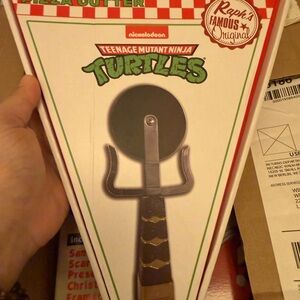 Nickelodeon TMNT Pizza Slicer with Black and Brown Handle